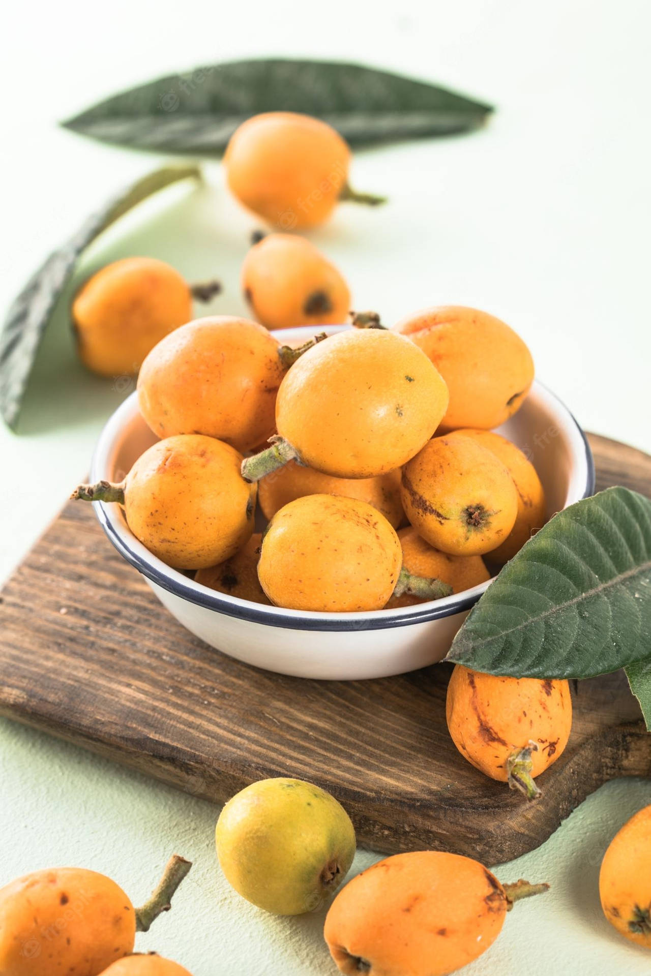 loquat-fruits-on-chopping-board-zls5jff3bh393he7